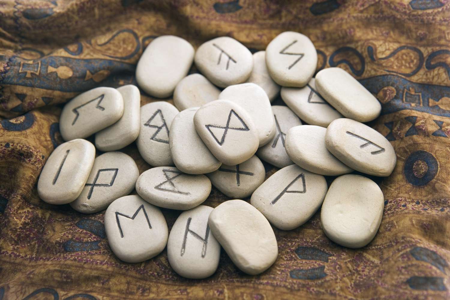 The Ancient Art of Casting Runes - The Chi Addict
